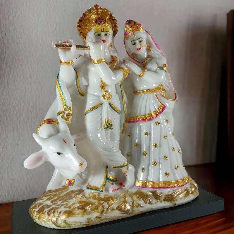 Radha Krishna with Cow Idol